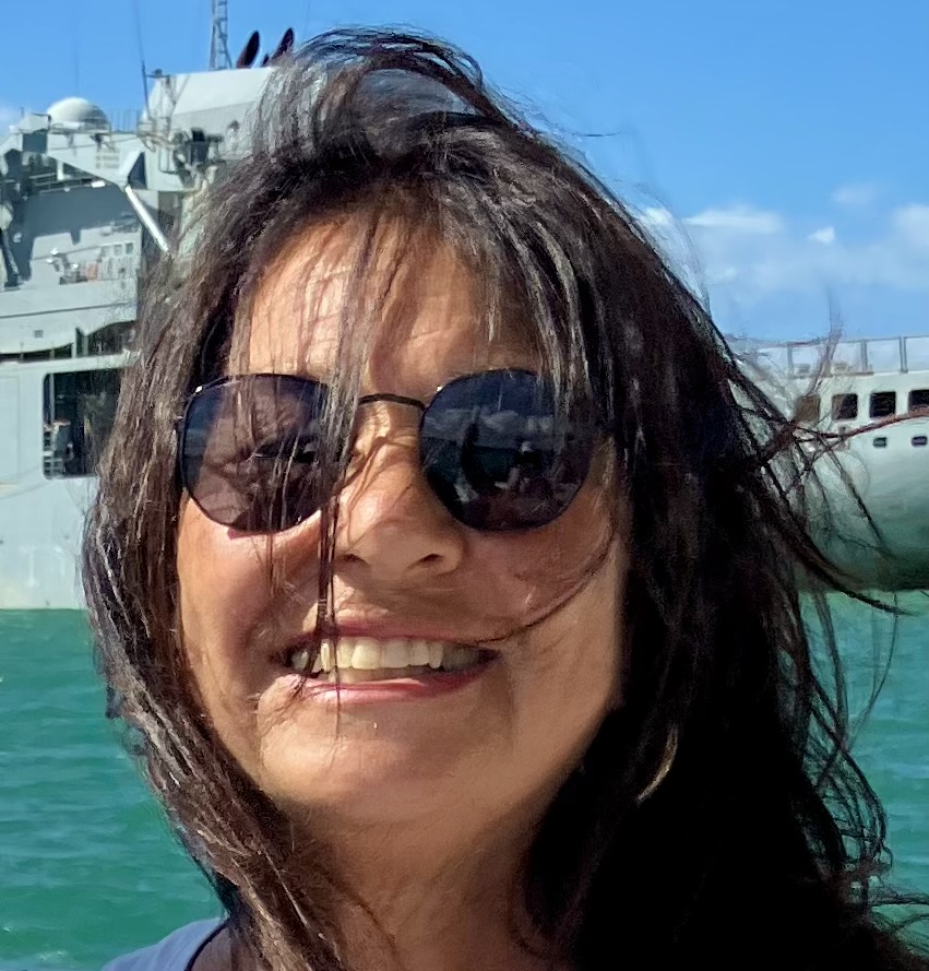 Irene Gottlieb — who writes as Rachel Old — a sunny selfie by the water